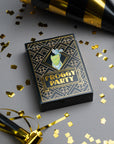 Froggy Party card game box with gold confetti and party hats on a gray background